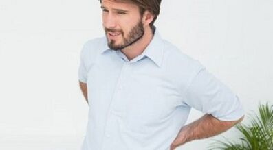 Why the back hurts at the lower back